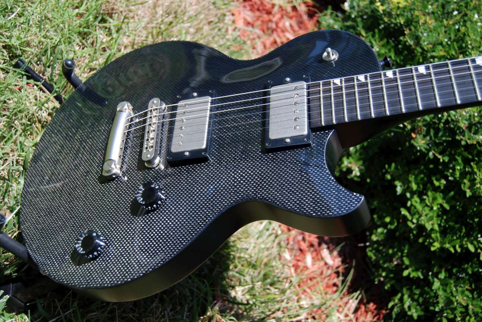 Thoughts on Carbon Fiber in guitar building. The Gear Page